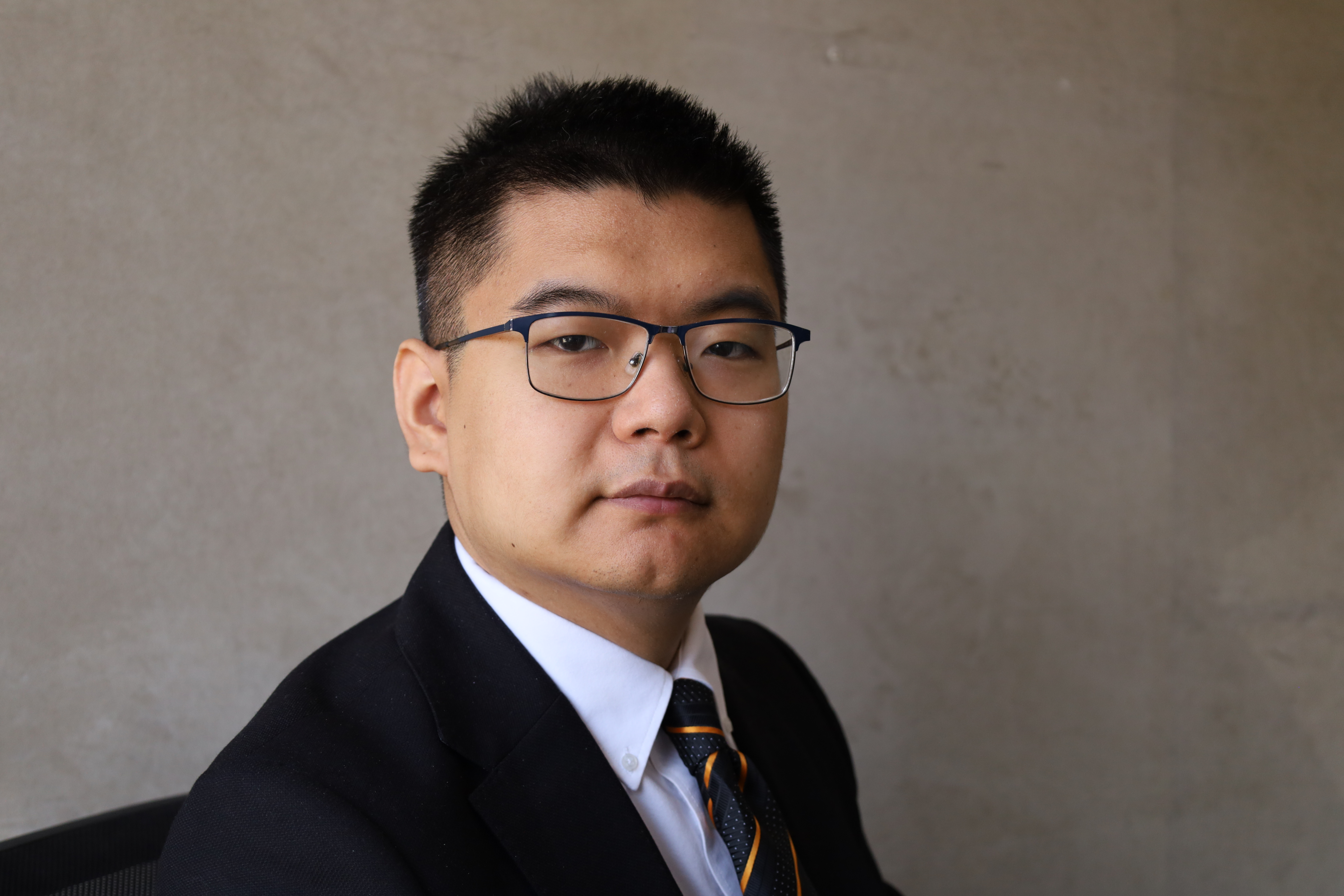 Portrait of Benjamin Feng, founder and principal lawyer of Ordo Law